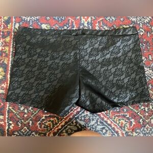 Lace print faux leather shorts
